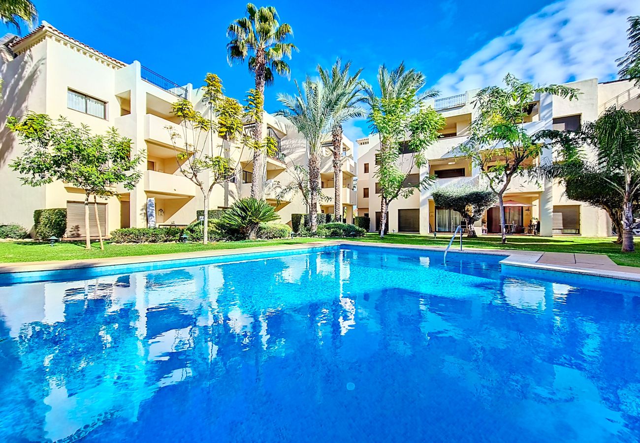 Apartment in Roda Golf Resort with terrace, garden and pool access and proximity to golf, beaches and dining options.